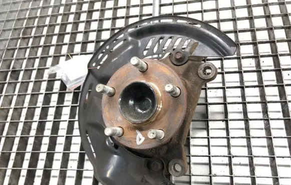 Front wheel hub spindle knuckle