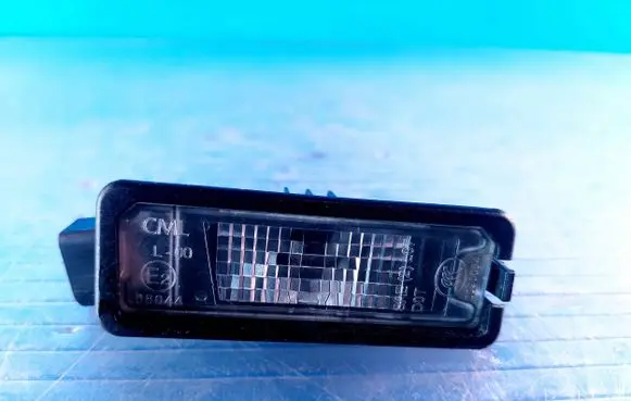 Volkswagen PASSAT B7 Number plate light 1K8943021