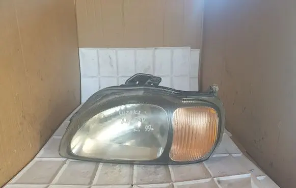 Suzuki Baleno EG Headlight/headlamp 10032617
