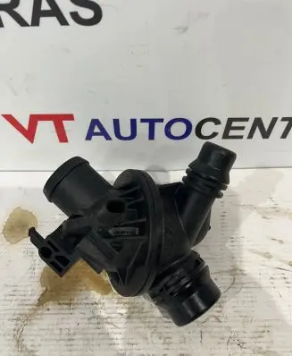 Thermostat/thermostat housing
