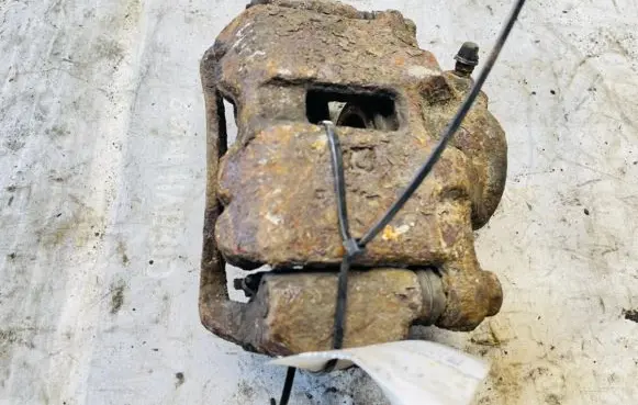 Mitsubishi Colt Front brake caliper