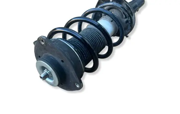 Volkswagen Golf VI Front shock absorber with coil spring 