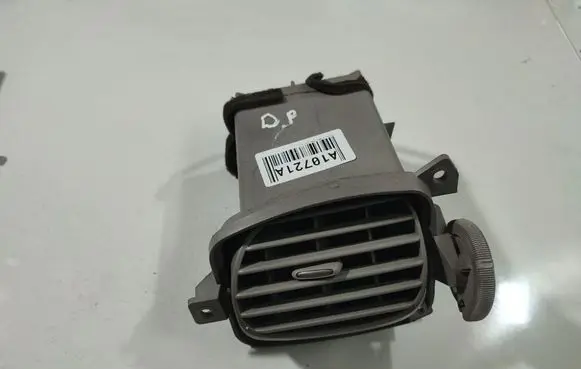 Nissan Almera Tino Dash center air vent grill 68760BU200