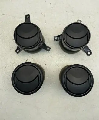 Mazda 2 Dash center air vent grill D65264930 K4366K6269