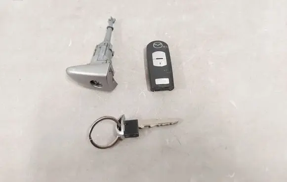 Mazda 6 Coupe door lock (next to the handle) 