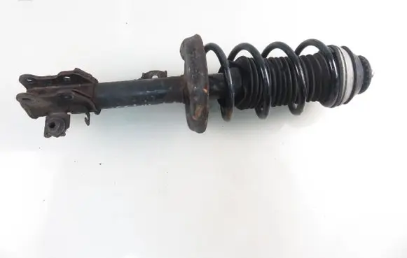 Opel Corsa D Front shock absorber with coil spring 13214358