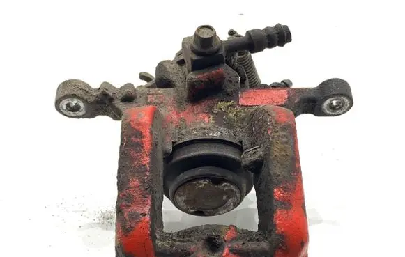 Opel Astra J Rear brake caliper 