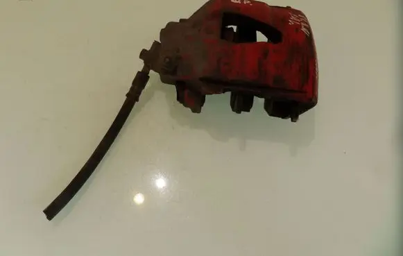 Volkswagen Golf IV Front brake caliper