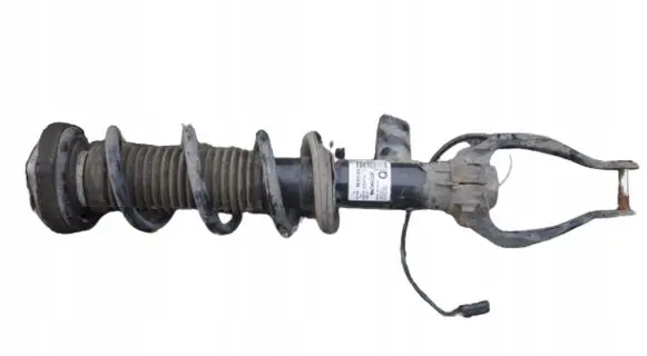 Infiniti Q60 Front shock absorber with coil spring 561115CH0A