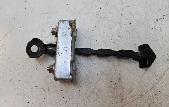 Mazda 2 Front door check strap stopper 