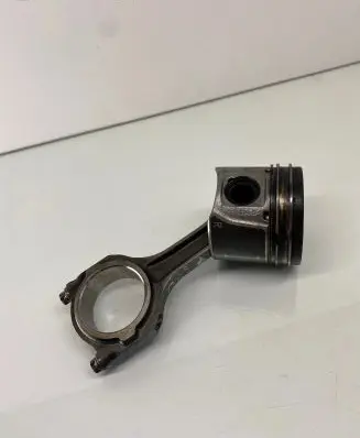 Piston with connecting rod