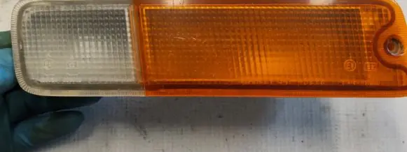 Mitsubishi L200 Rear bumper light 0414322R