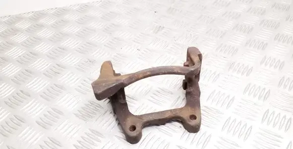 Volkswagen PASSAT B7 Brake caliper pad carrier rear 0107A
