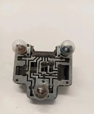 Tail light bulb cover holder