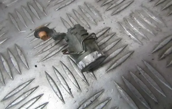 Mazda 626 Front door lock (next to the handle) 