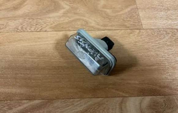 Toyota Avensis T250 Number plate light E1001479