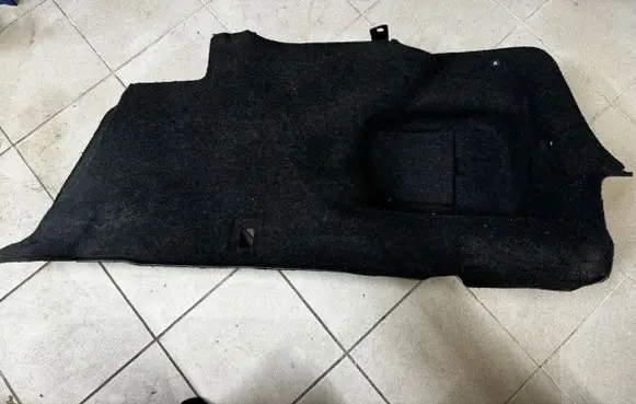 Trunk/boot lower side trim panel