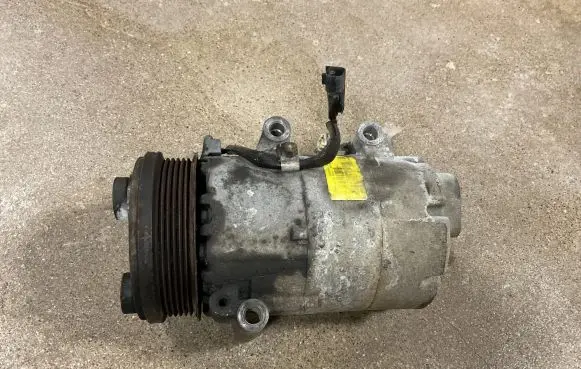 Ford Focus Air conditioning (A/C) compressor (pump) 4M5H19D629