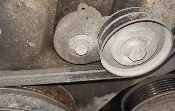 Generator/alternator belt tensioner