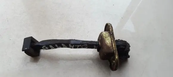 Mitsubishi Galant Rear door check strap stopper