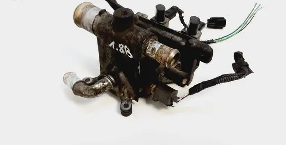 Thermostat/thermostat housing