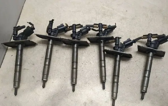 Volkswagen Touareg I Fuel injectors set 059130277bd 0445115079