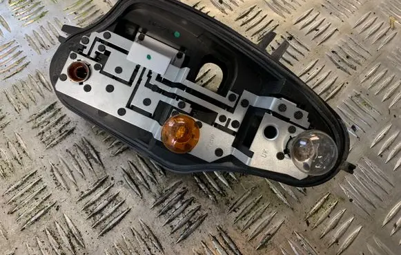 Citroen C3 Tail light bulb cover holder