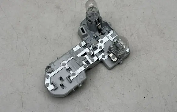 Volkswagen Golf Sportsvan Tail light bulb cover holder 510945260B