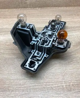 Volkswagen Touran I Tail light bulb cover holder 1T0945257A