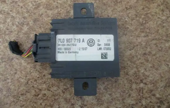 Volkswagen Touareg I Alarm control unit/module 7L0907719A