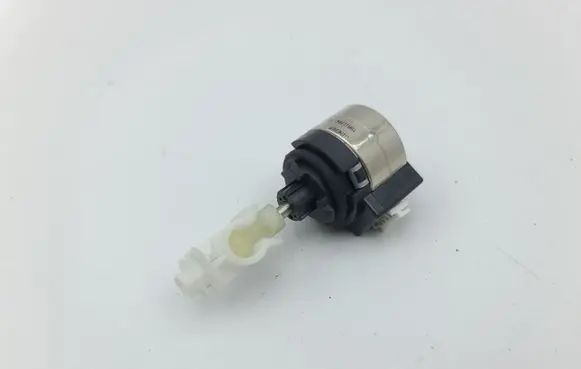 Opel Astra L Headlight level adjustment motor 7003114699