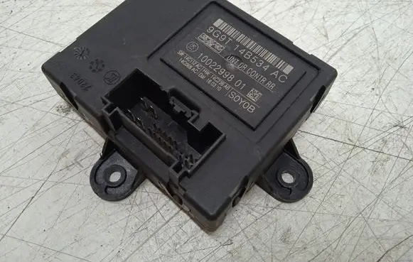 Volvo V70 Door control unit/module 9G9T14B534 1002299801
