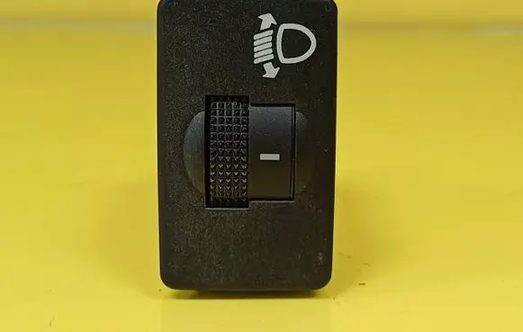 Ford Maverick Headlight level height control switch YL8413K196AAW