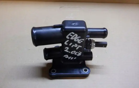 Thermostat/thermostat housing