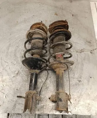 Subaru Outback Front shock absorber with coil spring