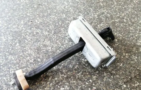 Rear door check strap stopper