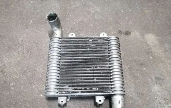 KIA Carens I Intercooler radiator 2827127350