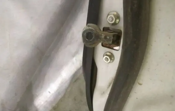 Mazda 2 Front door check strap stopper 