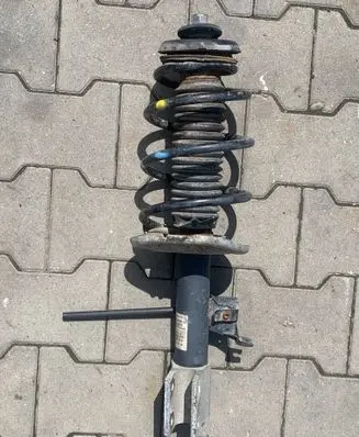 Citroen Berlingo Front shock absorber with coil spring 99980Y03