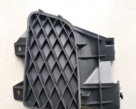 Mazda 323 Front bumper lower grill MZ04079021A