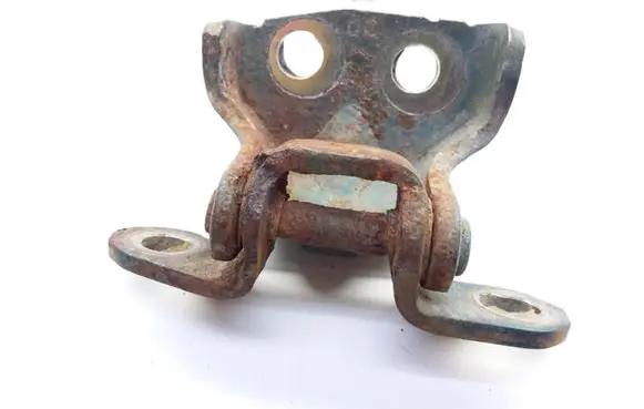 Nissan Almera Tino Front door lower hinge 