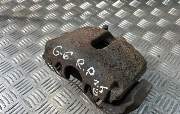 Volkswagen Golf VI Front brake caliper