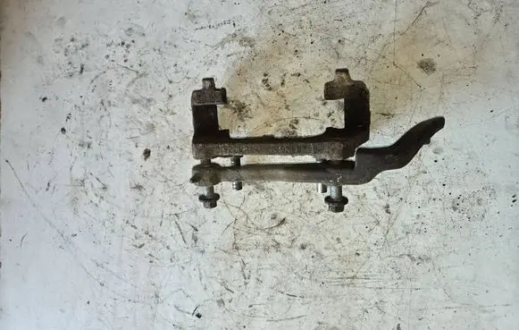 Volvo S60 Front Brake Caliper Pad/Carrier