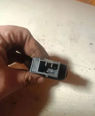 KIA Carnival Fuel tank opening switch 