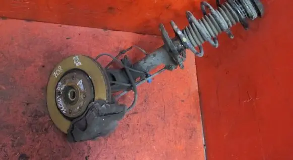 Peugeot 208 Front shock absorber with coil spring