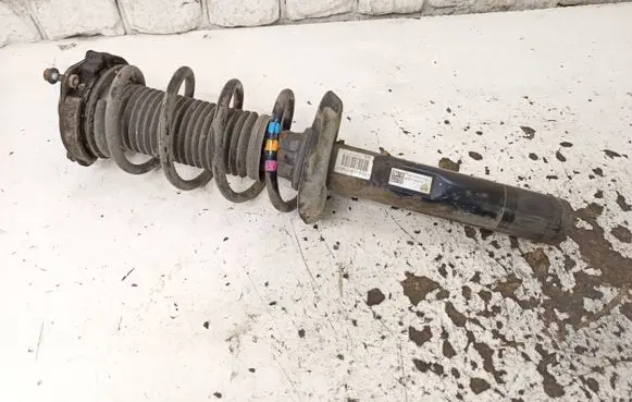 Volkswagen Golf Plus Front shock absorber with coil spring