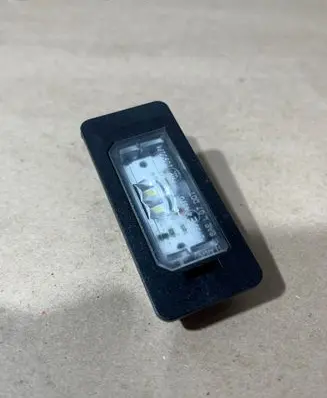 BMW 3 F30 F35 F31 Number plate light 7193293 2351839a