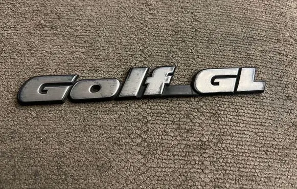 Volkswagen Golf III Manufacturers badge/model letters 1H6853687K