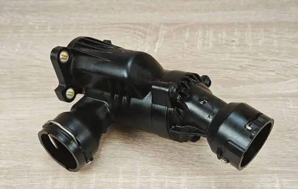 Thermostat/thermostat housing