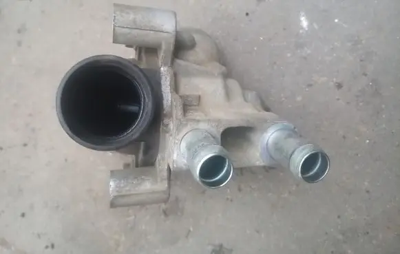 Thermostat/thermostat housing